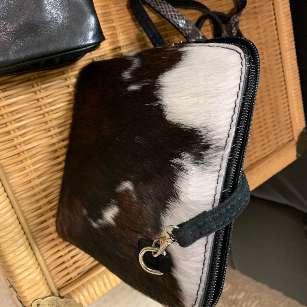 Crossbody bag cowhide black white and brown fashionable bagNew never been used!